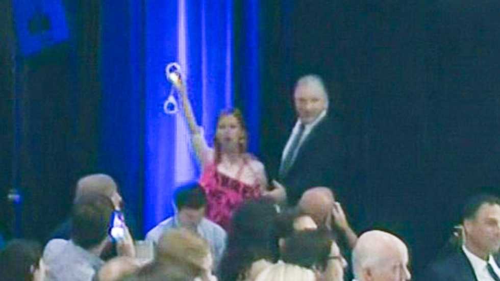 Broadcast interrupted as protester with handcuffs tries to arrest Dick Cheney