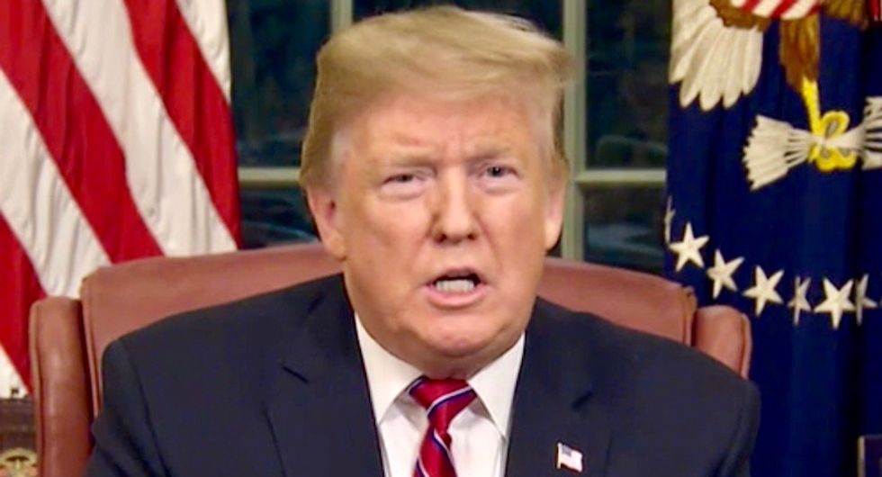 Trump again threatens to use a 'national emergency' to build his wall and rants it is his 'absolute right'