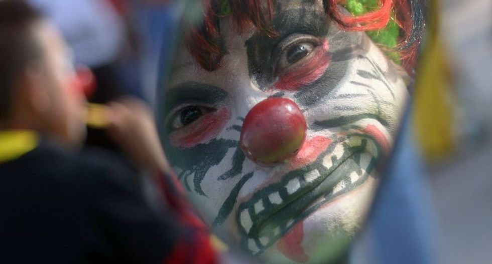Ohio dad arrested for punishing 6-year-old girl by chasing her through neighborhood in clown mask