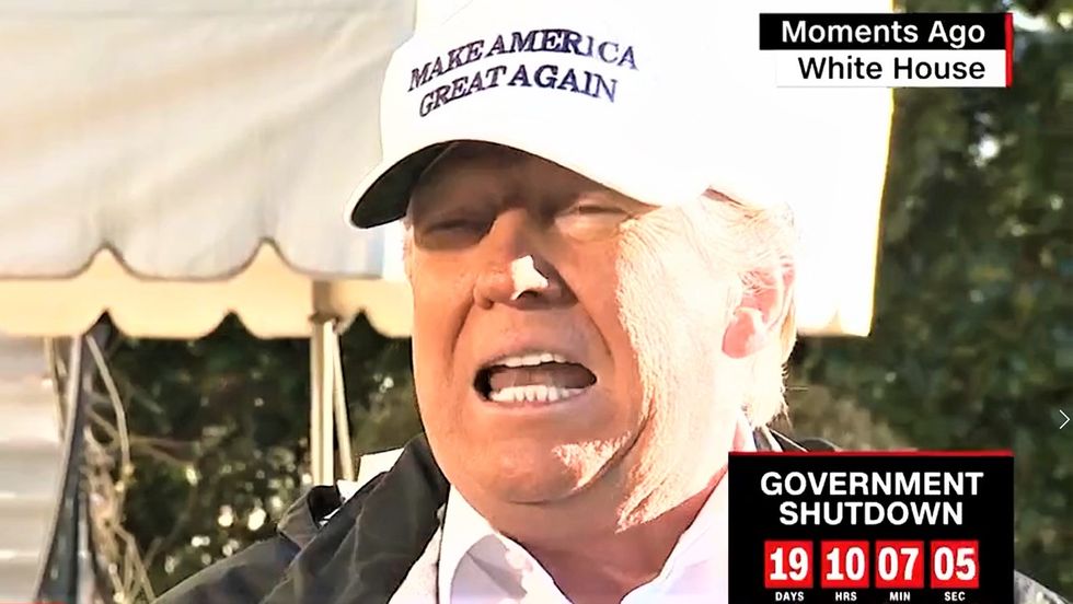 WATCH: Trump rages at reporter for pointing out he did nothing on the wall for two years
