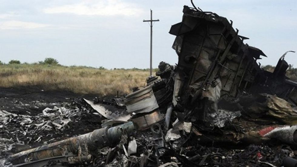 Ukraine: Separatists are stealing bodies and evidence from MH17 crash site