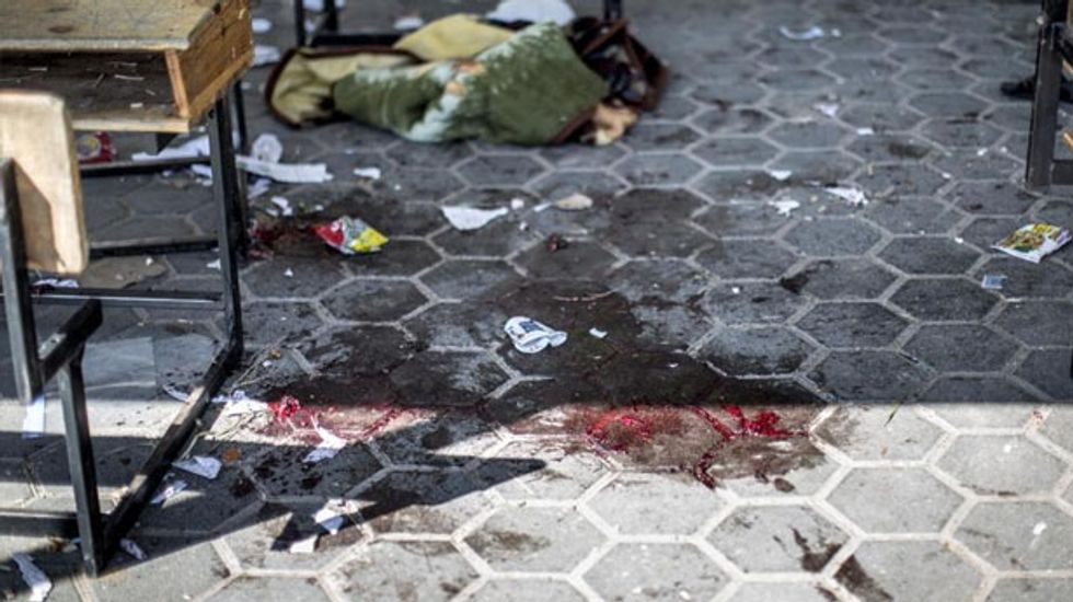 Baby among nine dead as Israeli shell hits UN school in Gaza