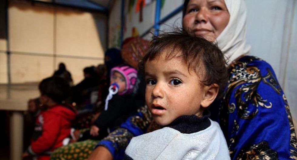 Georgia governor withdraws order to refuse Syrian refugees