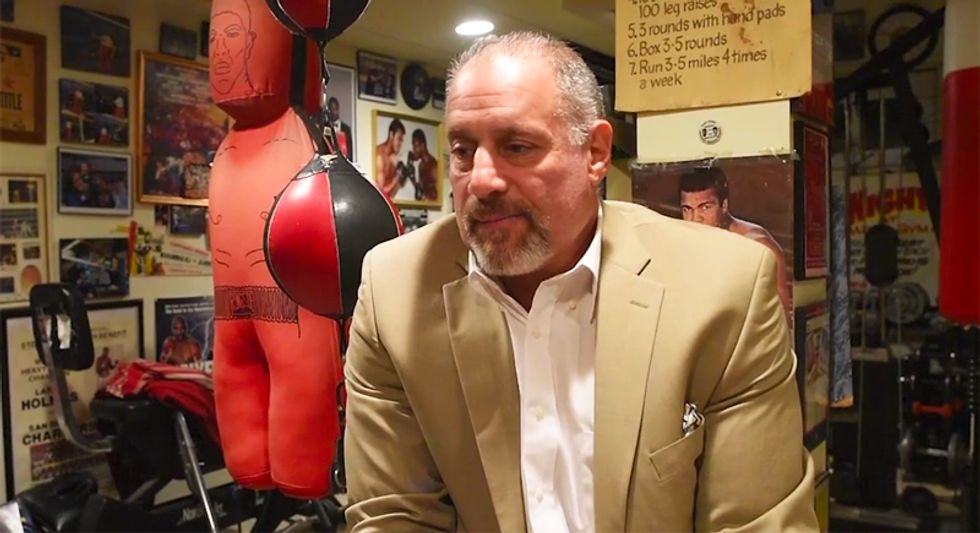 School suspends teacher after he admits flunking students for sitting out the pledge