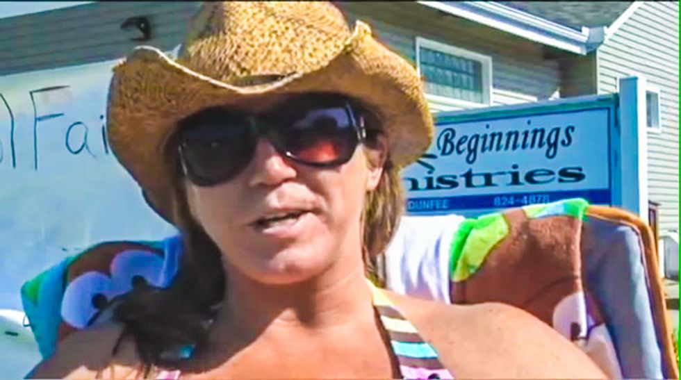 Ohio strippers take topless protest to church that harassed them as 'whores, tramps' for nine years