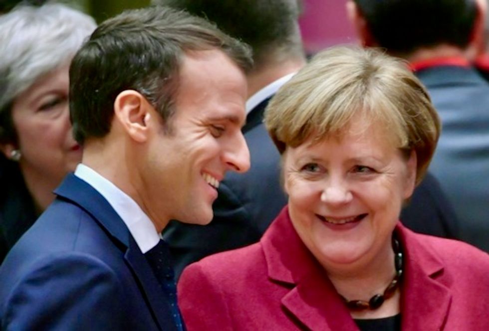 France, Germany seek closer bond to tackle EU crisis