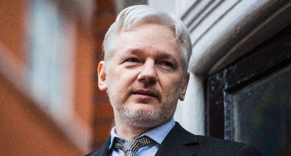 Putin's favorite congressman urges Trump pardon for Assange in exchange for 'proof' Russia didn't meddle in election