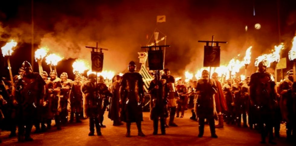 Axes, armor, torches: Vikings feast on Scottish island