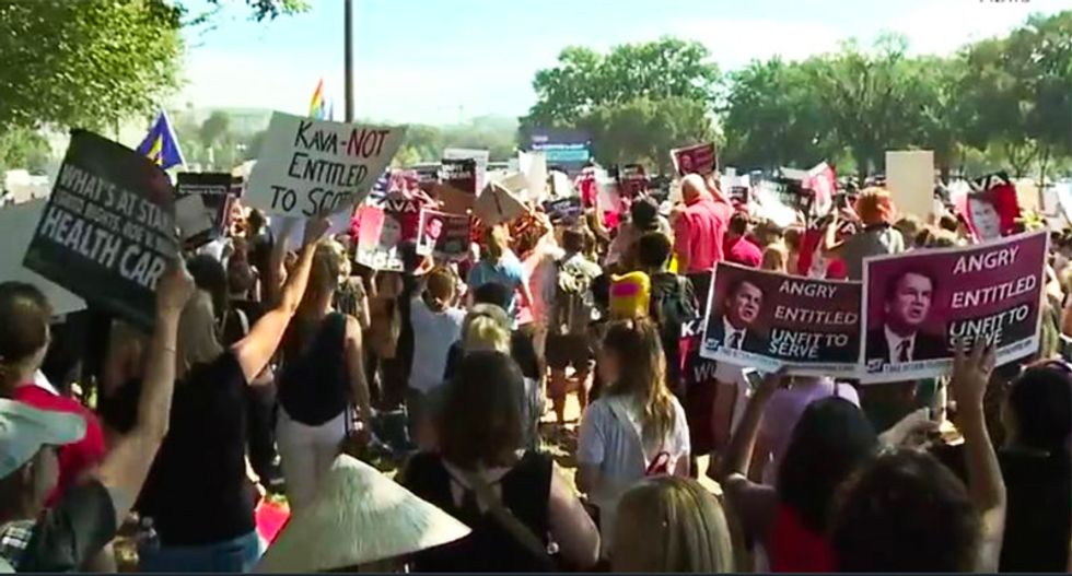 Watch live: Activists across the US take to the streets as GOP-led Senate confirms Brett Kavanaugh