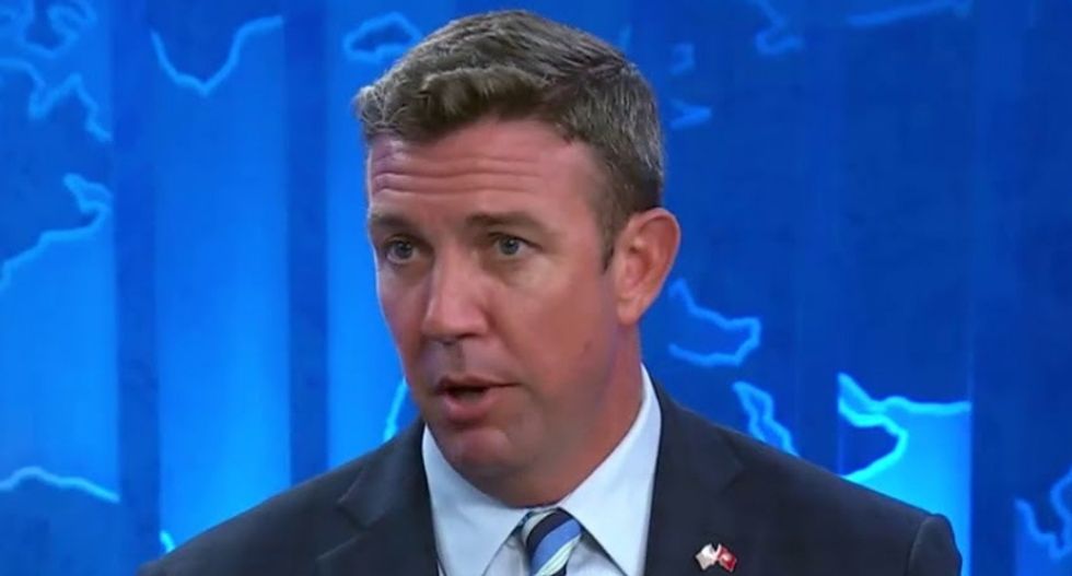 DOJ seeks to throw out indicted congressman's law firm for allegedly representing both sides