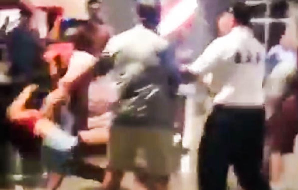 WATCH: Unhinged Alabama fan punches woman and throws her to the ground during stadium brawl