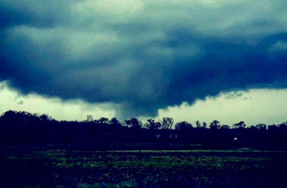 At least 23 dead in Alabama tornadoes, winter not over for northeast