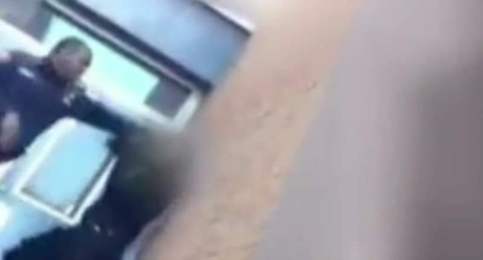 Baltimore cop caught slapping student on video charged with child abuse