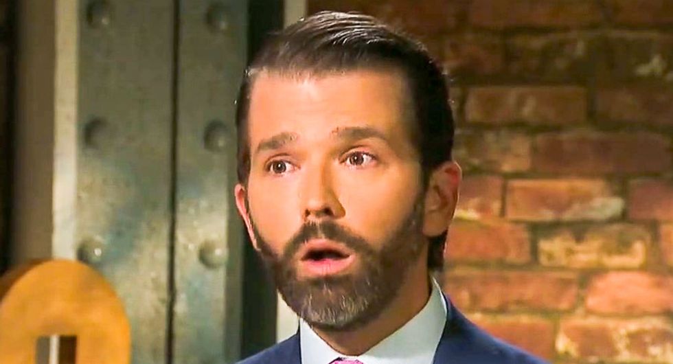 'Your dad raped 22 women!' Don Trump Jr. shredded by heckler after he accuses Dems of 'normalizing pedophilia'