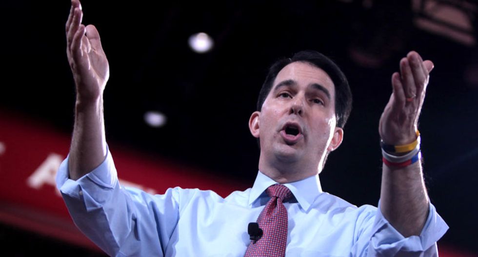 Scott Walker says would target federal government unions if elected president