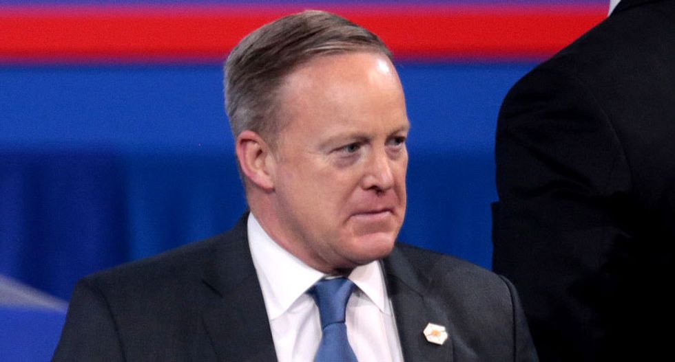 Sean Spicer denies Trump is bailing on British visit -- but won't say when he'll go