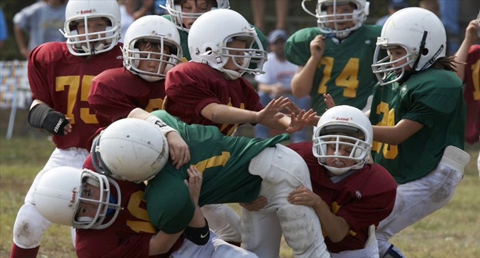 Wisconsin woman's lawsuit: Youth football 'war game' caused 25-year-old son's suicide