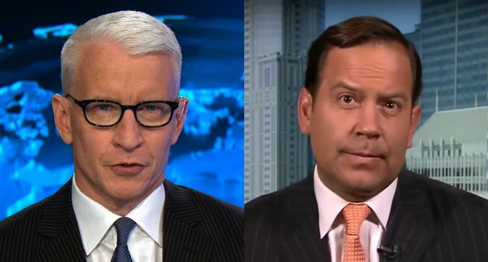 'Let’s play it again': CNN's Cooper brutally fact-checks ex-Trump adviser with president's own words