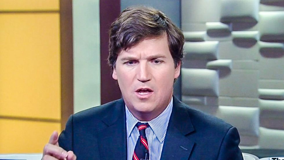 Fox News' Tucker Carlson attacks NAACP as 'discredited': 'Does that make me a racist?'