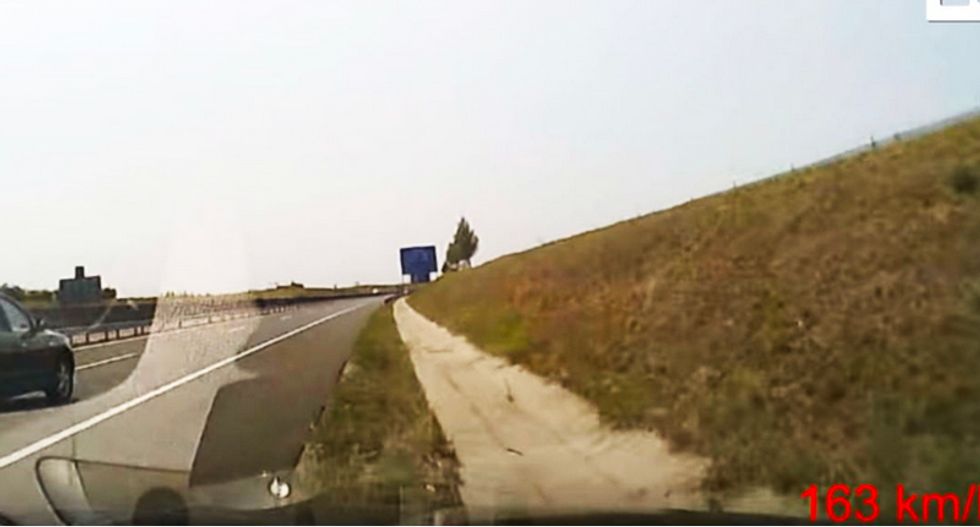 WATCH: Video catches the stomach-turning moment a motorist going over 100 mph fell asleep at the wheel