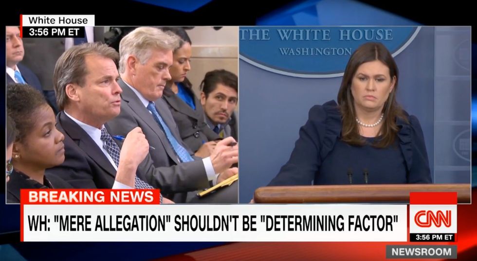 'He relayed that statement to me': Sarah Sanders melts down when asked why Trump won't condemn wife abuse