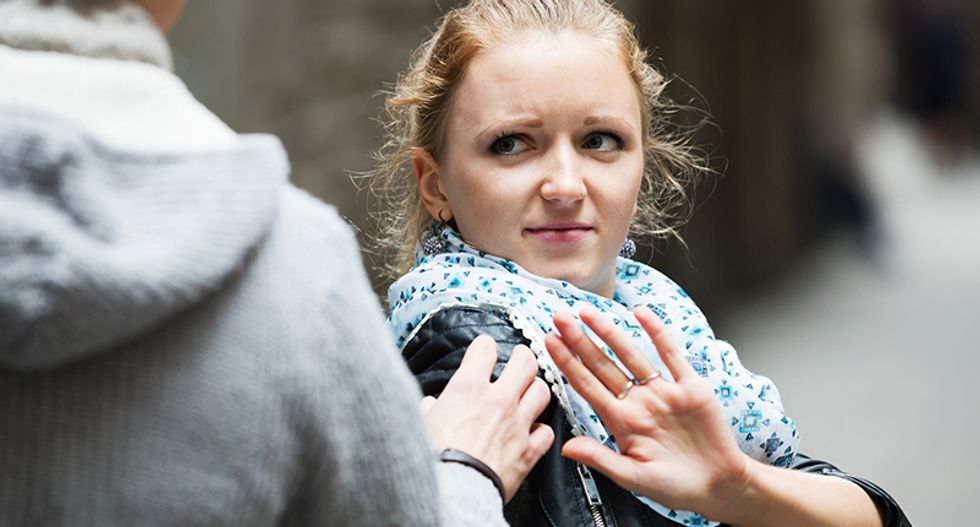 Men chased woman on train, took photos, made sexual gestures and called her 'white trash'