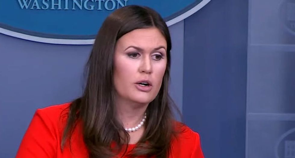 Internet lashes out at Sarah Sanders 'Freudian slip' claim that Trump's anthem tantrum is 'black and white'