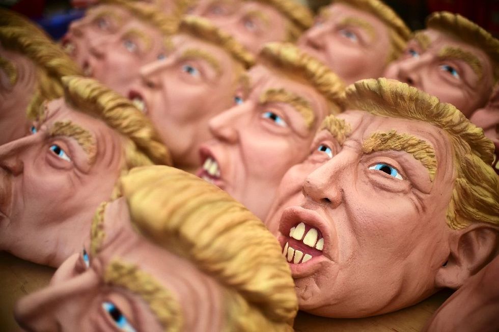 Two men wearing Trump masks 'beat the devil out of each other' at a Virginia Lowe's: witness