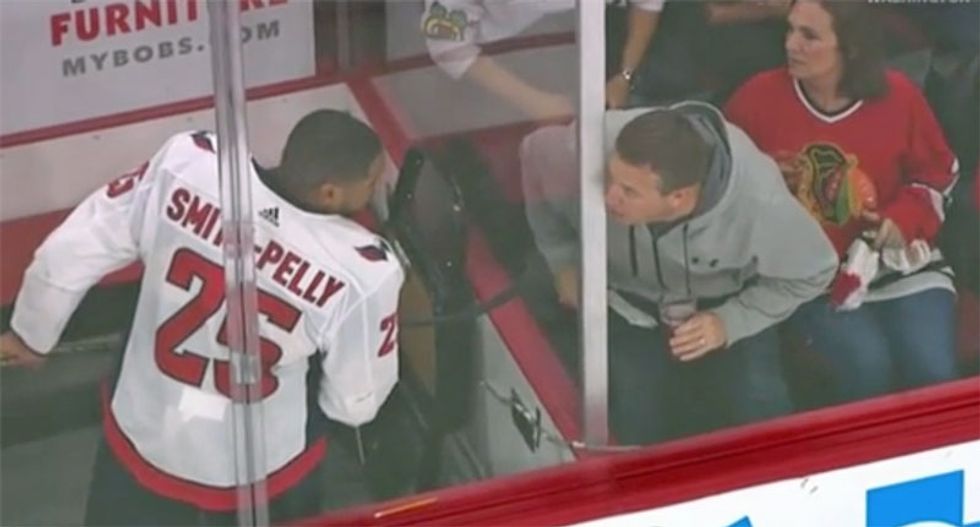 NHL's Chicago Blackhawks ban four fans for life after racist attack on black player