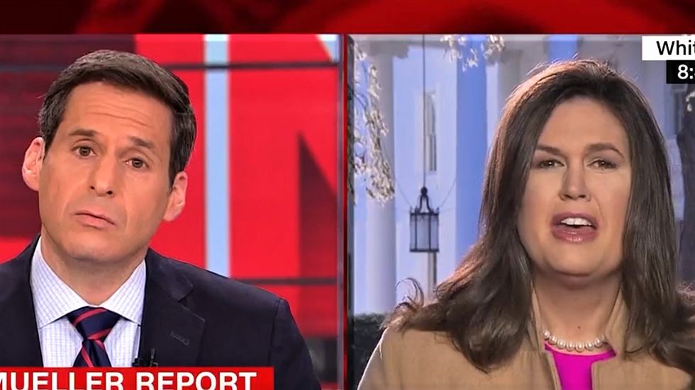 CNN's John Berman schools Sarah Sanders after she tries to rant about Democrats 'overthrowing' Trump