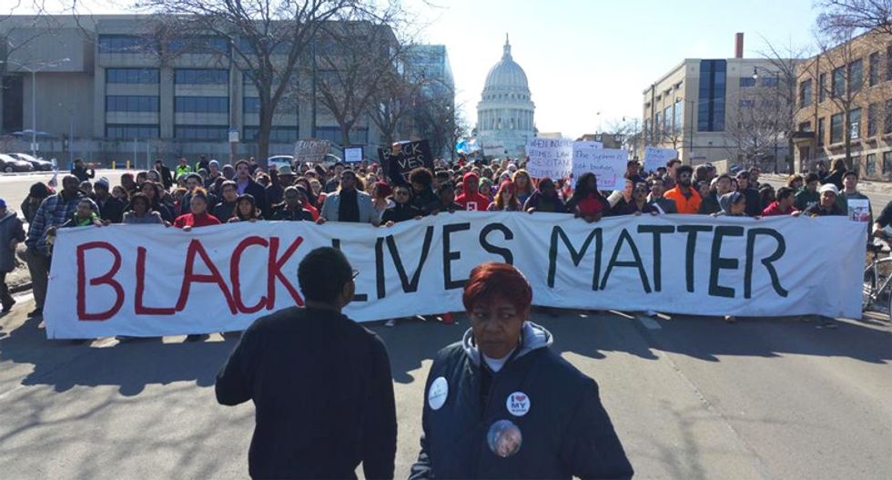Protesters march in Wisconsin after black teen shot: 'The whole damn system is guilty as hell'