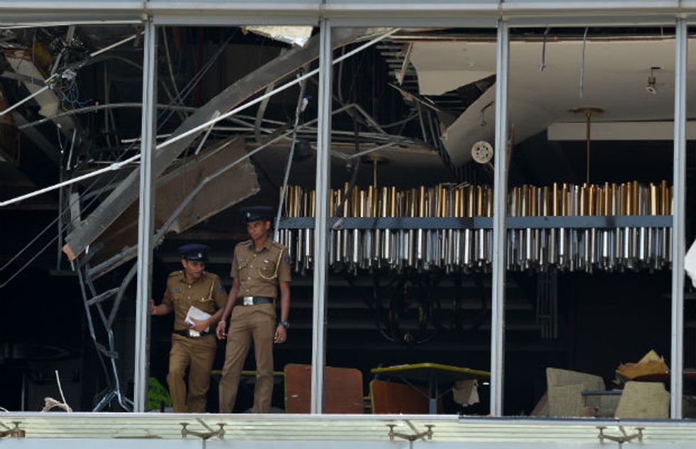 More than 130 killed as blasts hit Sri Lankan churches and hotels on Easter Sunday