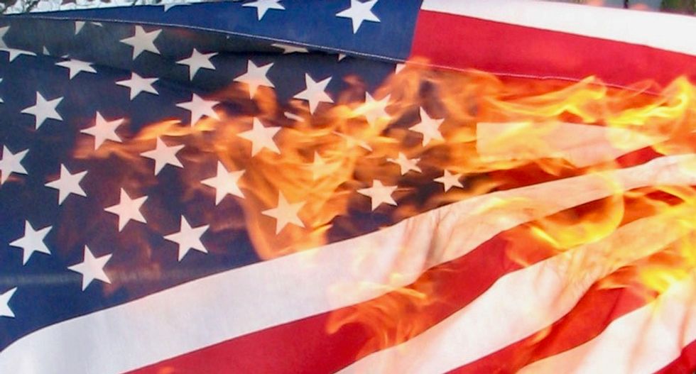 Illinois man sues police over flag burning arrest