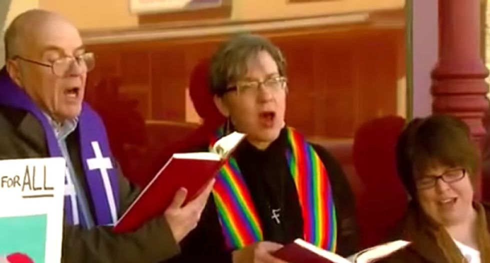 Gay-friendly Christian choir shames Memories Pizza by singing about love in front of shuttered store