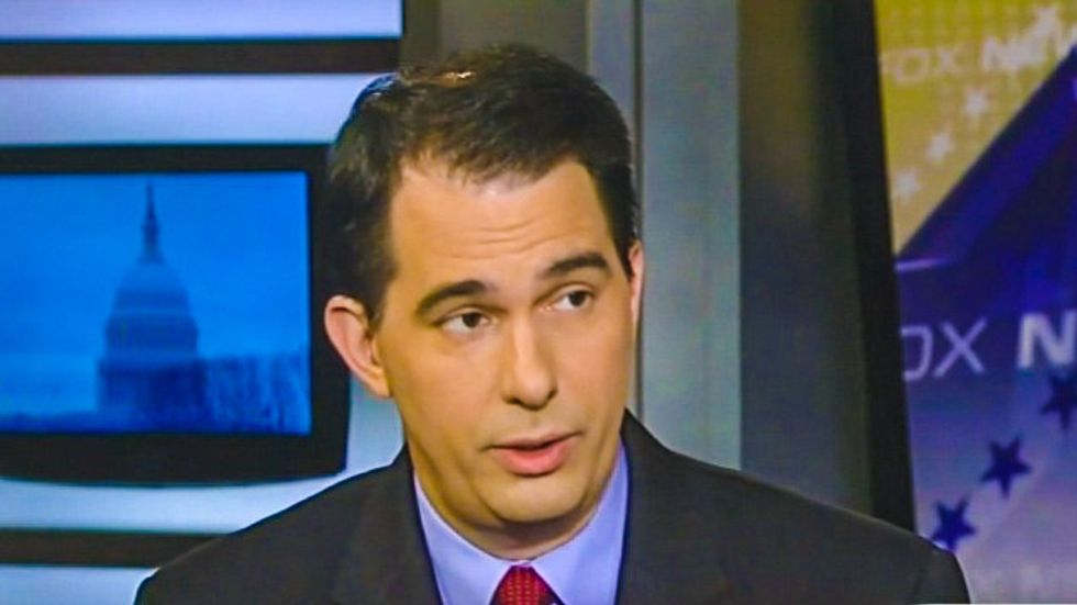 Scott Walker in London: 'I'm going to punt' on whether evolution is real