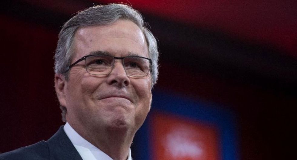 Jeb Bush touts willingness to monitor cell phones in new TV ad slamming frontrunners