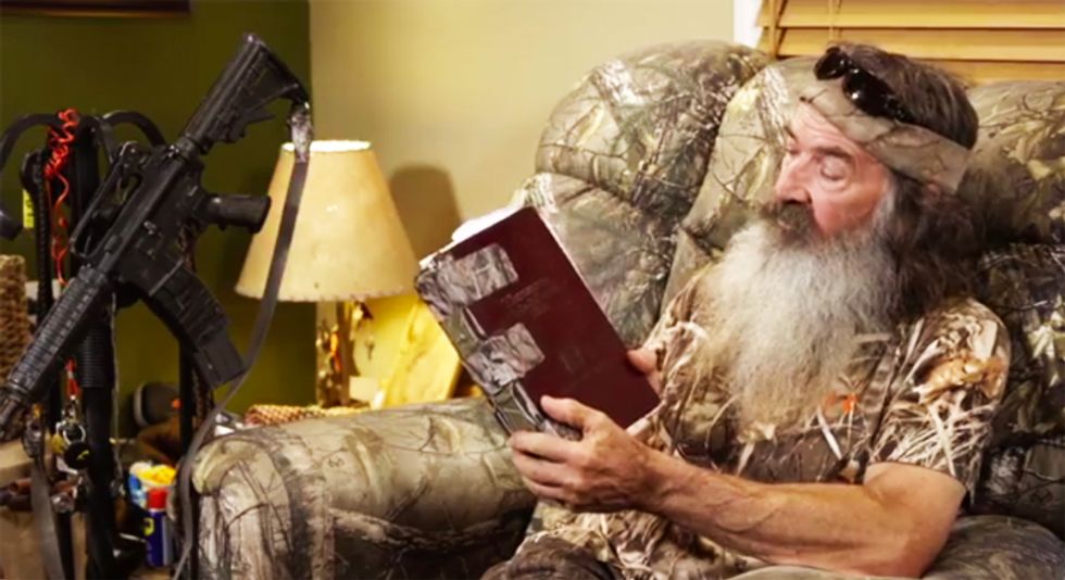 Duck Dynasty cast member poses with AR-15 while boasting Bible will 'stop human beings from murdering'