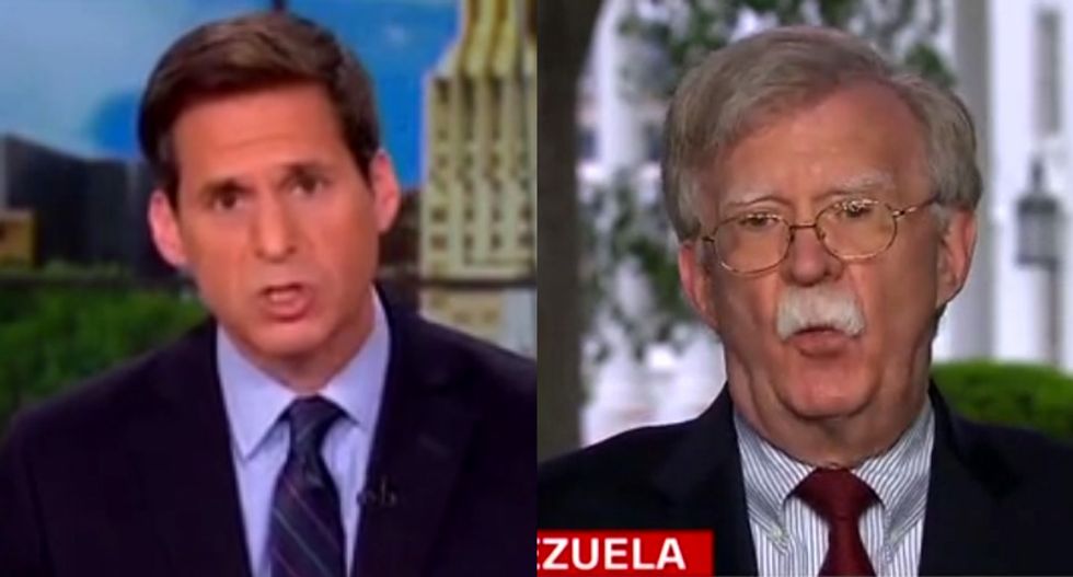 Bolton accuses CNN host of lying about a call between Trump and Putin -- then gets confronted with the transcript