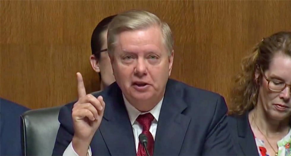 Lindsey Graham blames Democrats after Trump says he welcomes more foreign meddling
