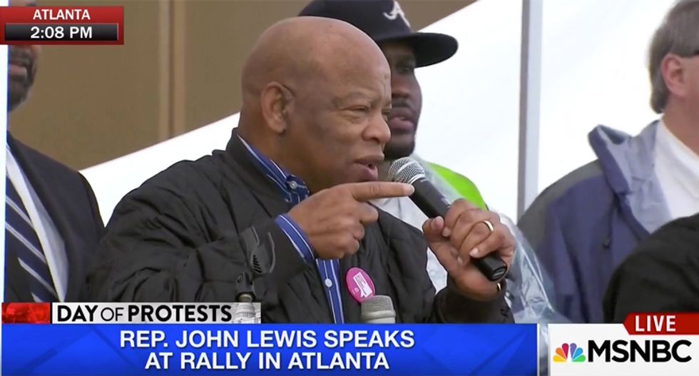 'I know a thing about marching': Watch John Lewis's stunning speech at Atlanta women's rally