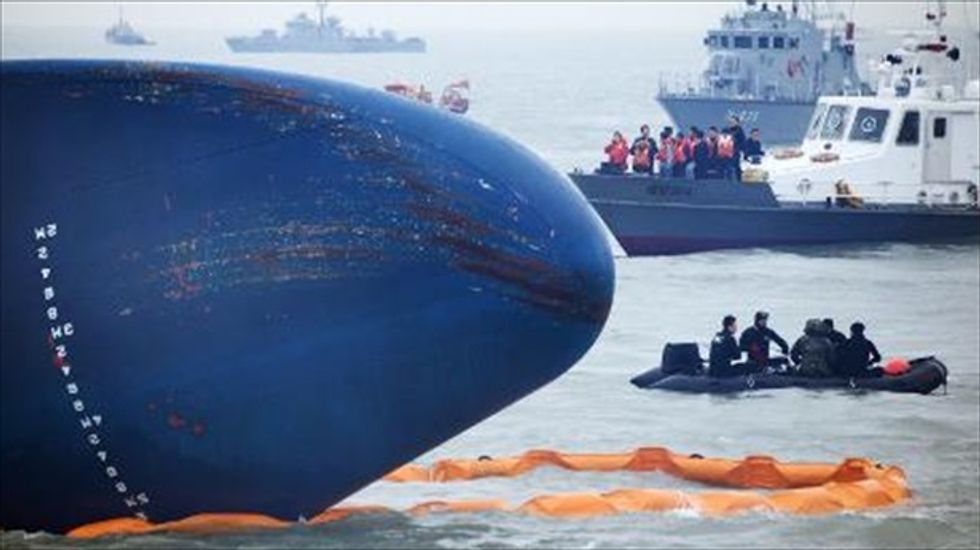 South Korean president accepts responsibility for ferry disaster, will dismantle coast guard