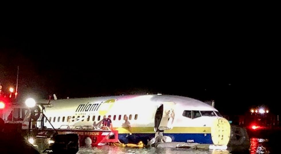 Boeing plane skids into Florida river in crash-landing - no fatalities