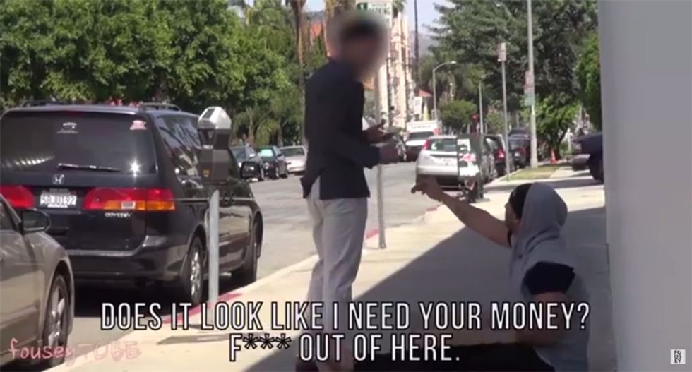 WATCH: A ‘homeless’ guy offers money to people walking by — and their reactions will shock you