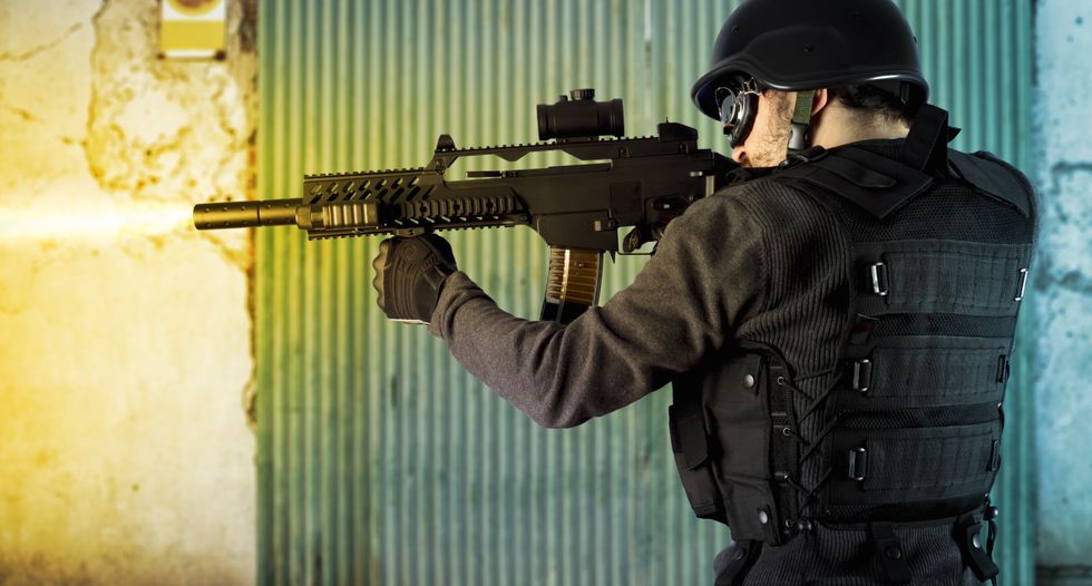 SWAT team leader who fatally shot 7-year-old during reality show filming gets job back