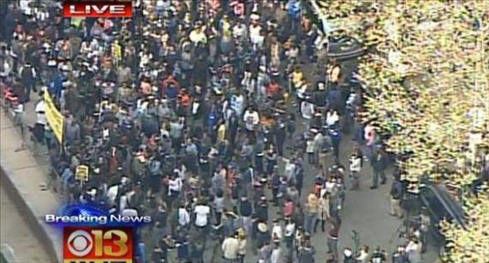 Hundreds of protesters march in Baltimore as Justice Dept. announces probe of Freddy Gray's death
