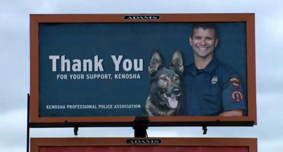 Community outraged by Kenosha billboard featuring killer cop's beaming face