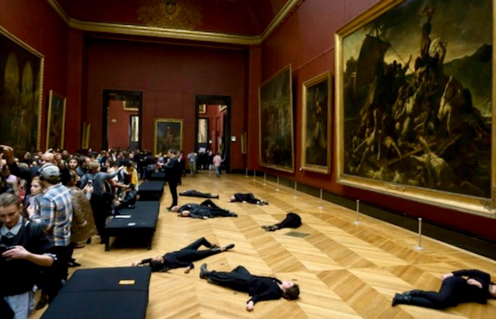 Climate protest prompts partial evacuation at Louvre