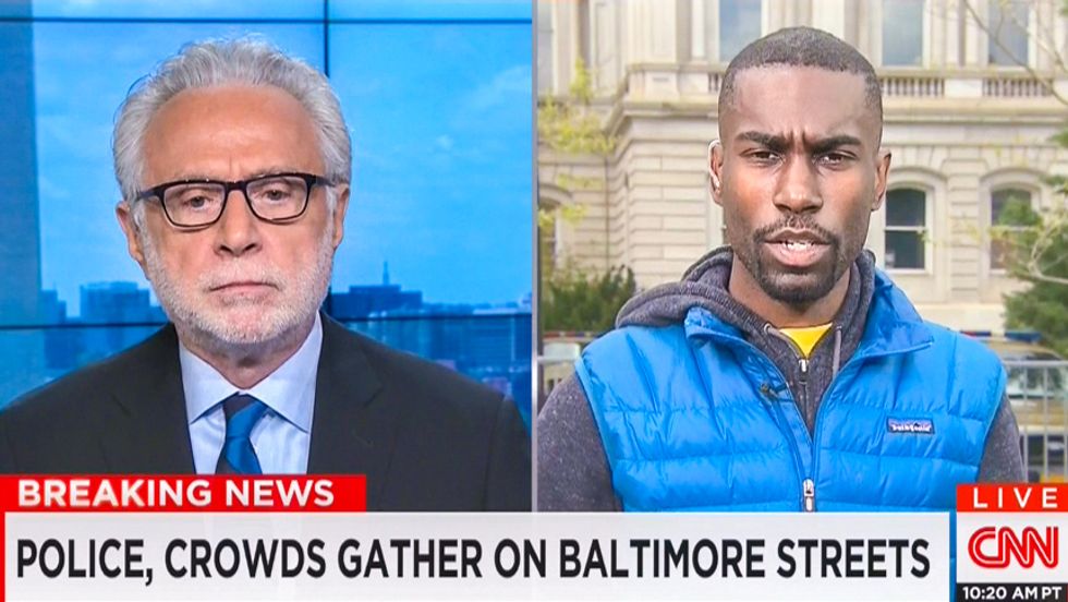 Activist smacks down Wolf Blitzer: 'You are suggesting broken windows are worse than broken spines'