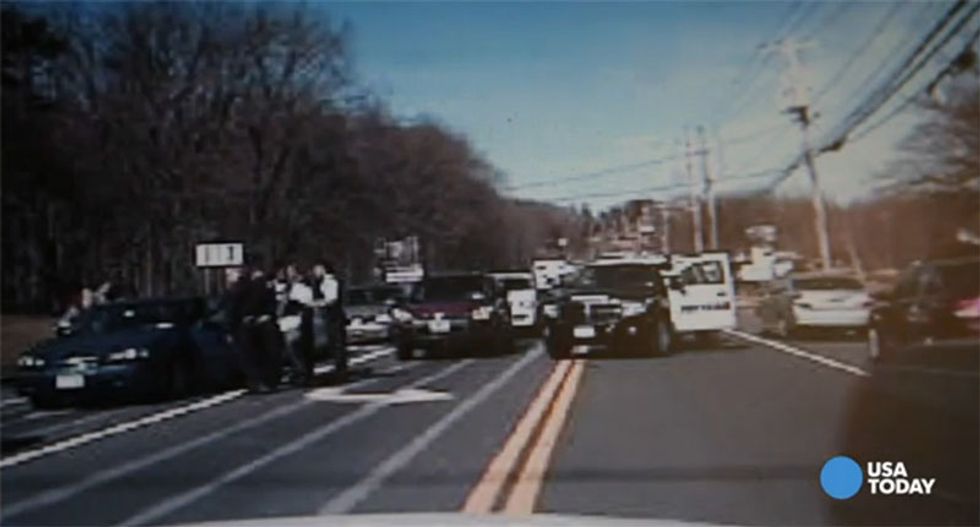 Video shows four parole officers detained by gun-wielding police for Driving While Black