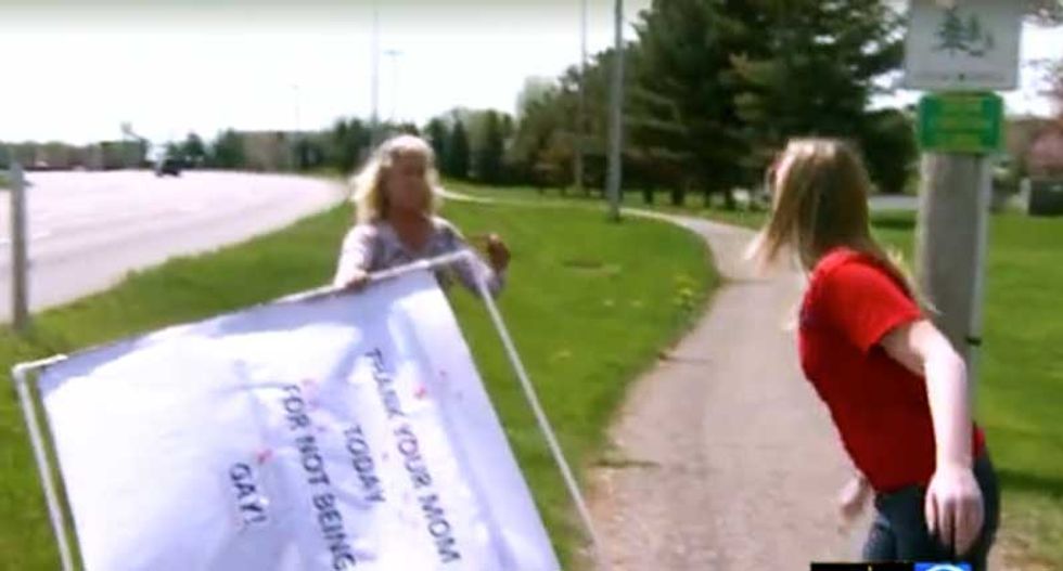 Anti-gay Michigan Mother’s Day protester gets torpedoed with pink slushy — and it’s awesome
